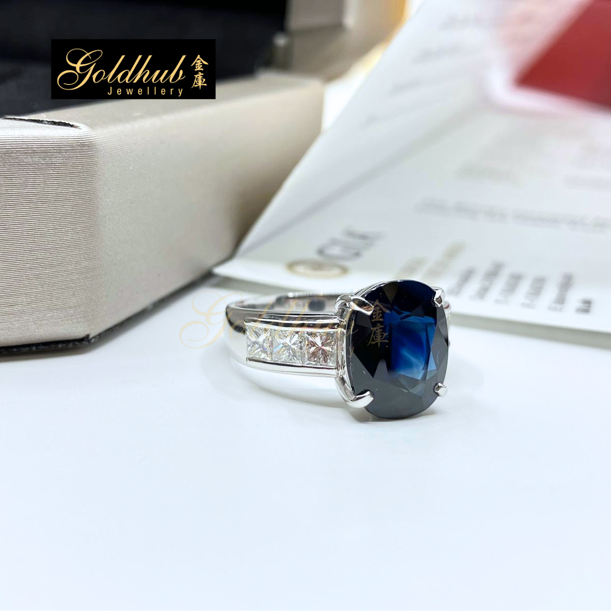 5.10ct Oval Shape Blue Sapphire Ring with 6 Square Modified Brilliants Diamonds in Platinum