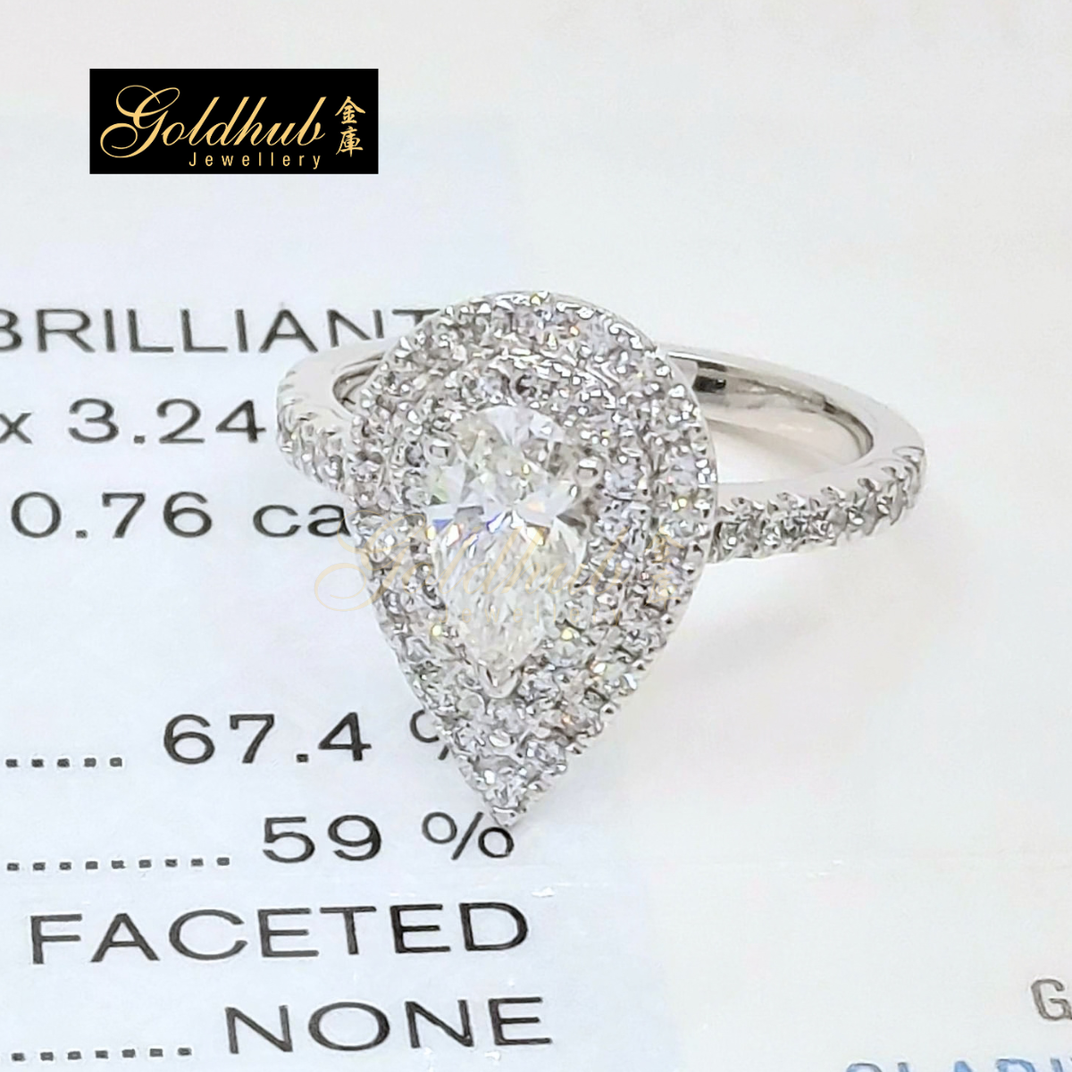 0.76ct Pear Diamond Halo Ring in Platinum