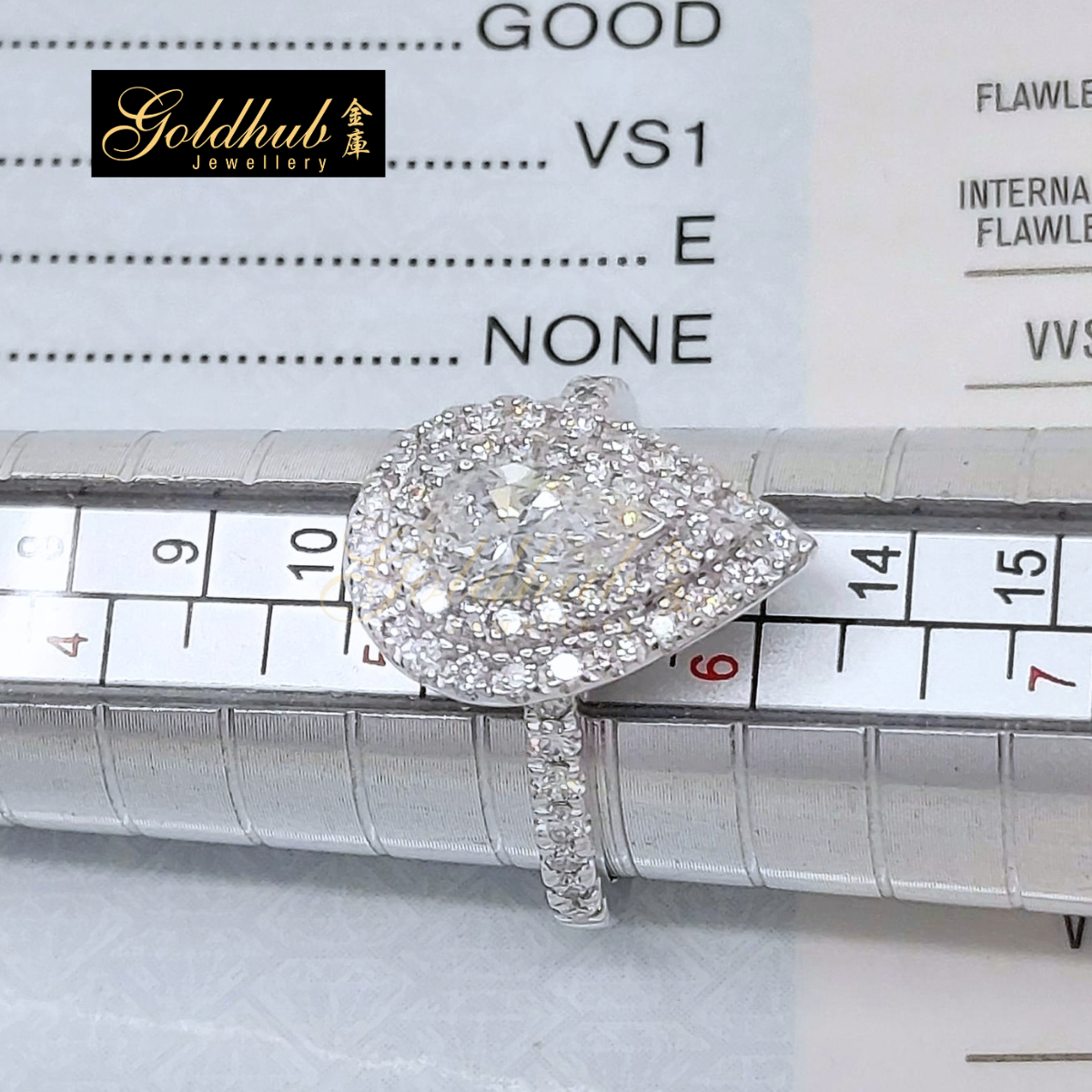 0.76ct Pear Diamond Halo Ring in Platinum