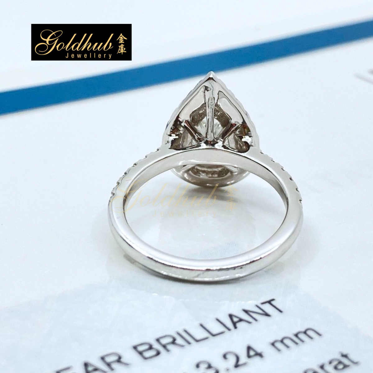 0.76ct Pear Diamond Halo Ring in Platinum