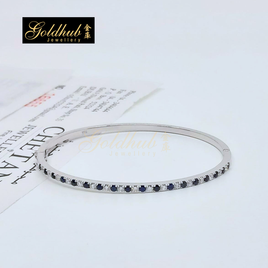 Blue Sapphire and Diamonds Bangle in White Gold