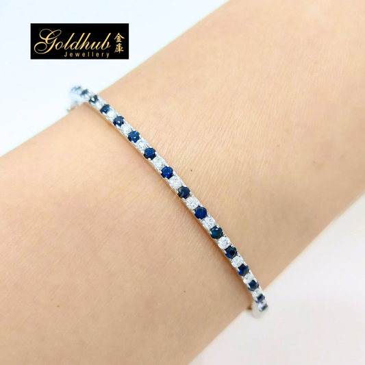 Blue Sapphire and Diamonds Bangle in White Gold