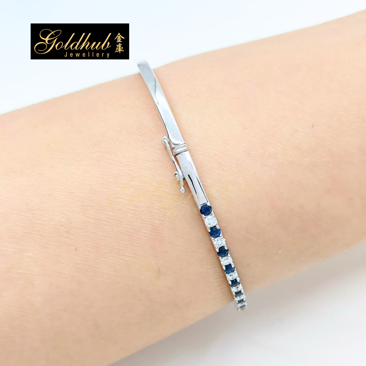 Blue Sapphire and Diamonds Bangle in White Gold